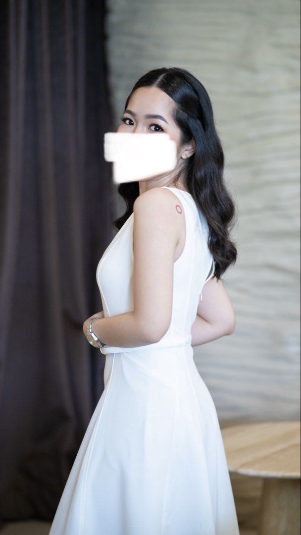 Civil Wedding Dress with Pockets (Category: Dresses) located in Quezon City. Submitted by kpa10 (Listing ID 1435503455, Image 3). Description: - White sleeveless dress - Fitted bodice - A-line skirt - Matching belt - Boat neckline - Keyhole back detail - Mid-calf length - Ideal for formal occasions.