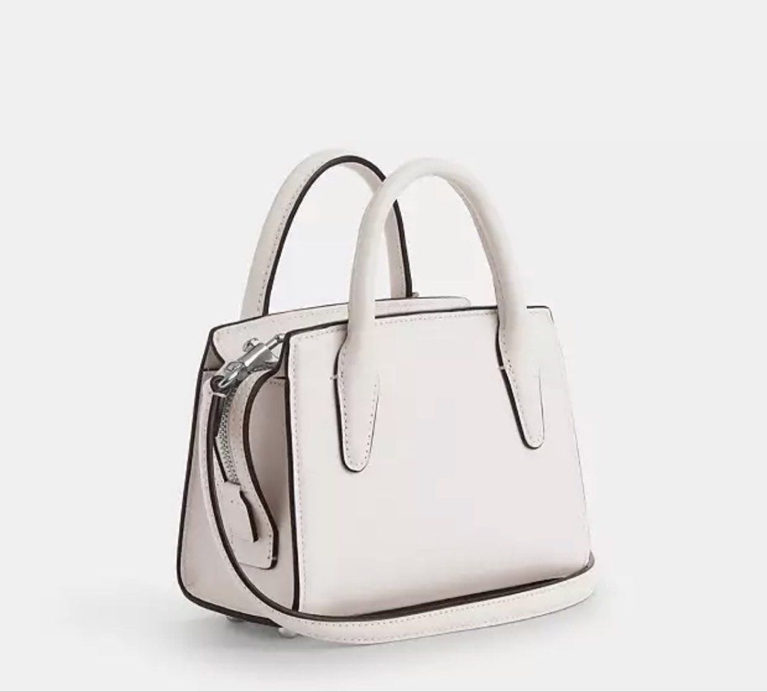Coach Andrea Mini Carryall (Category: Luxury Bags & Wallets) located in Calamba. Submitted by harpercloset (Listing ID 1435423561, Image 2). Description: Authentic and used once only! Bought from Japan With dustbag and paper bag.