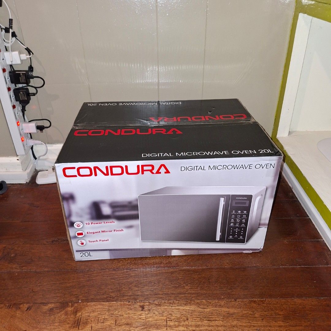 Condura digital microwave oven (Category: Cookers) located in Pasig City. Submitted by fasttech01 (Listing ID 1435378982, Image 2). Description: This is available as long as this is posted/visible listing. You may message me with the answer to the following questions once you are fully decided to purchase, should you need further thinking and canvassing you may just save the listing for future reference. 1. Will you be personally picking it up or