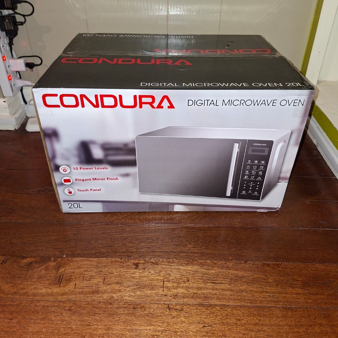 Condura digital microwave oven (Category: Cookers) located in Pasig City. Submitted by fasttech01 (Listing ID 1435378982, Image 1). Description: This is available as long as this is posted/visible listing. You may message me with the answer to the following questions once you are fully decided to purchase, should you need further thinking and canvassing you may just save the listing for future reference. 1. Will you be personally picking it up or