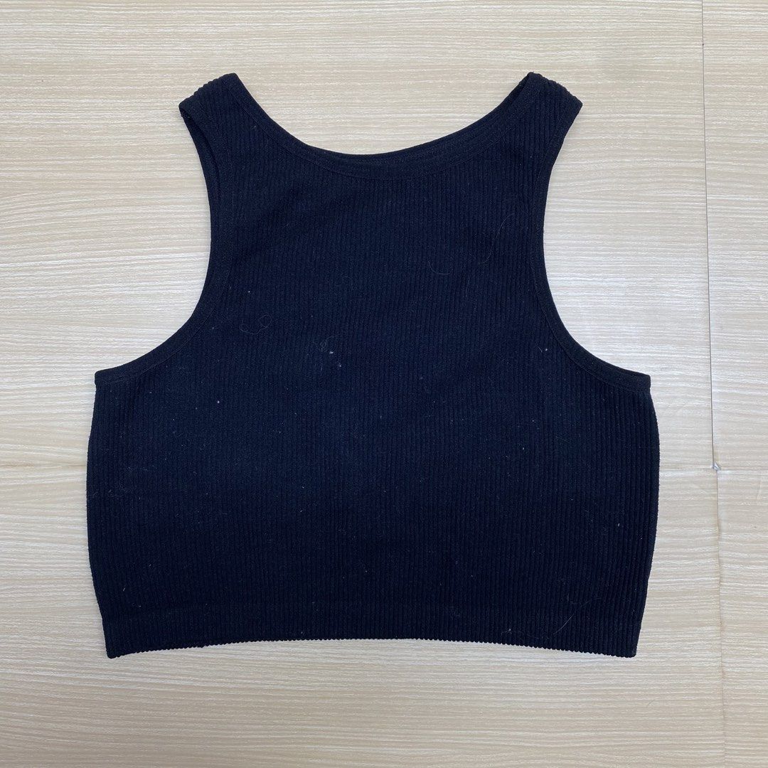 Cotton Candy Ribbed Tank Top S/M (Category: Sleeveless) located in Navotas City. Submitted by jericafits (Listing ID 1435345980, Image 1). Description: - Brand: Cotton Candy - Style: Black ribbed tank top - Size: S/M - Features: High neckline, cropped length - Material: Ribbed knit - Design: Sleeveless - Details: Perfect for layering or wearing alone. Includes care instructions on tag..