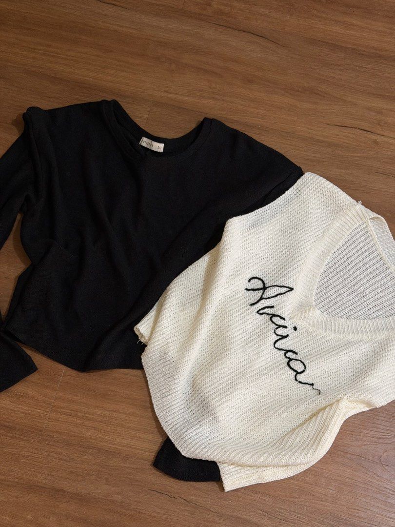 Cotton On Black and White Sweater (Category: Longsleeves) located in Mandaluyong City. Submitted by wardrobeloop (Listing ID 1435498201, Image 1). Description: - Bundle includes two knitted sweaters: - Black long-sleeved sweater (Cotton On) - White open-knit sweater with "Avicia" embroidery.