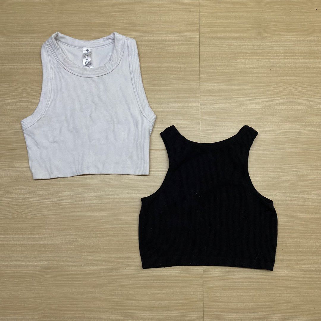 Cropped Tank Top for 2 (Category: Activewear) located in Navotas City. Submitted by jericafits (Listing ID 1435345998, Image 1). Description: ribbed tank top - Size: xs-m - Color: Light - Features: Crew neck, cropped design, racerback - Texture: Ribbed - Versatile: Suitable for workouts and casual wear (Black) Brand: Cotton Candy - Style: Black ribbed tank top - Size: S/M - Features: High neckline, cropped length - Material: Ribbed knit - Design: