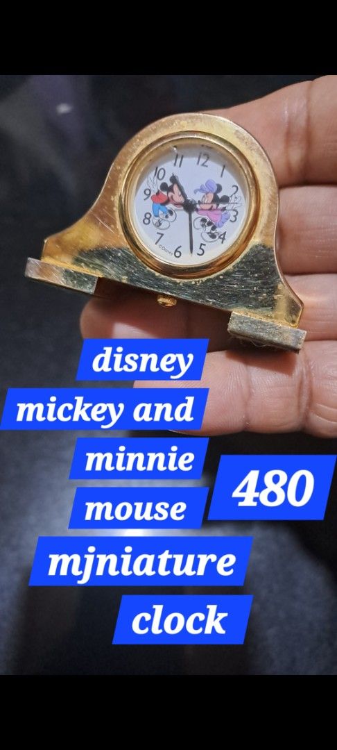 Disney Mickey and Minnie Mouse Miniature Clock (Category: Clocks) located in Davao. Submitted by bravemoon_556cd5 (Listing ID 1435520116, Image 1). Description: - Mickey & Minnie Mouse miniature clock - Gold-tone finish - Quartz movement (Japan) - Triangle shape - Made in China - Price: ₱480.
