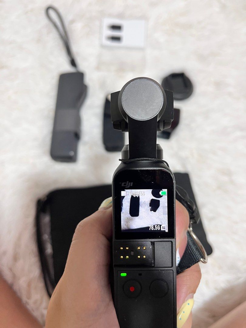 DJI Osmo Pocket 1 (Category: Gimbals & Stabilizers ) located in Las Pinas. Submitted by scarlet_stuff (Listing ID 1435351804, Image 1). Description: RFS: upgrade and seldom used and the stain was due to long storage Will get everything with SD card but the SD card is not compatible .