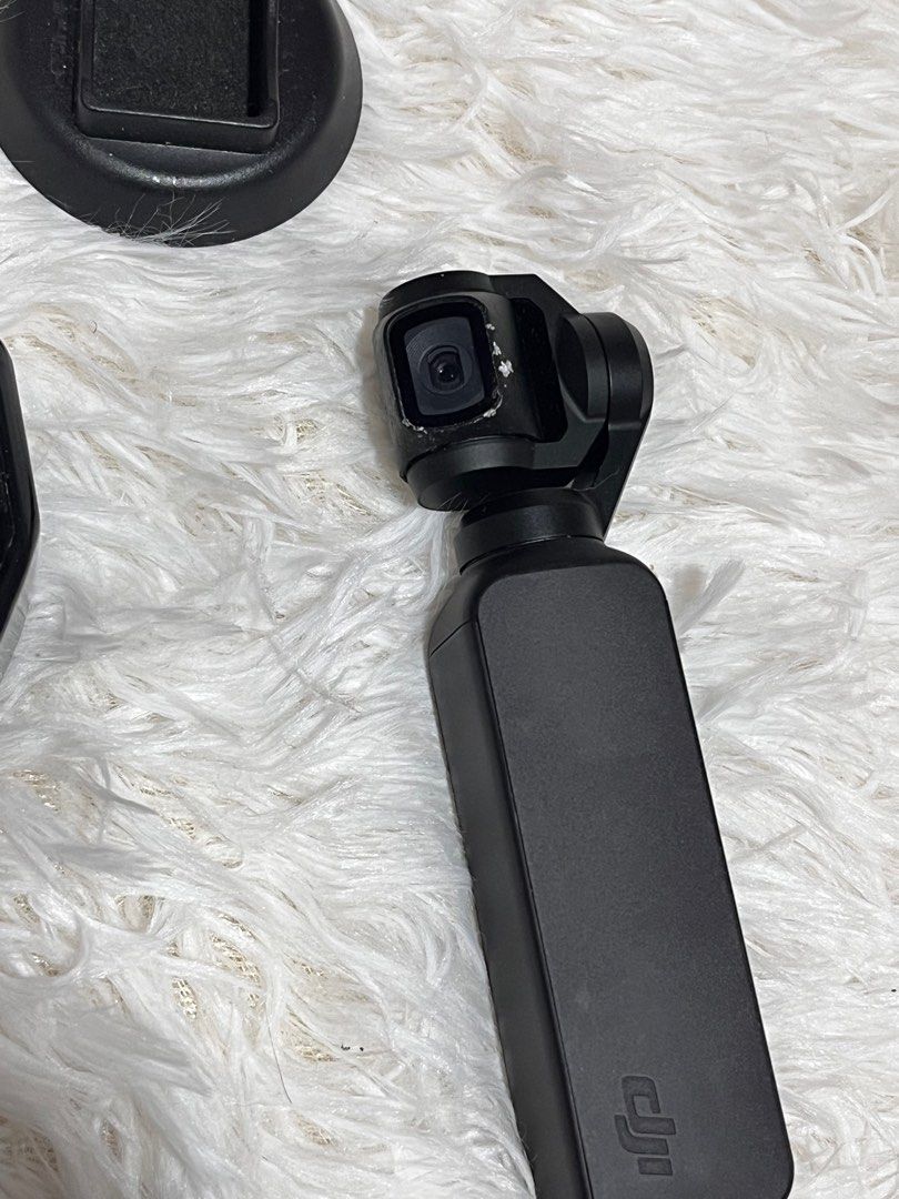 DJI Osmo Pocket 1 (Category: Gimbals & Stabilizers ) located in Las Pinas. Submitted by scarlet_stuff (Listing ID 1435351804, Image 3). Description: RFS: upgrade and seldom used and the stain was due to long storage Will get everything with SD card but the SD card is not compatible .
