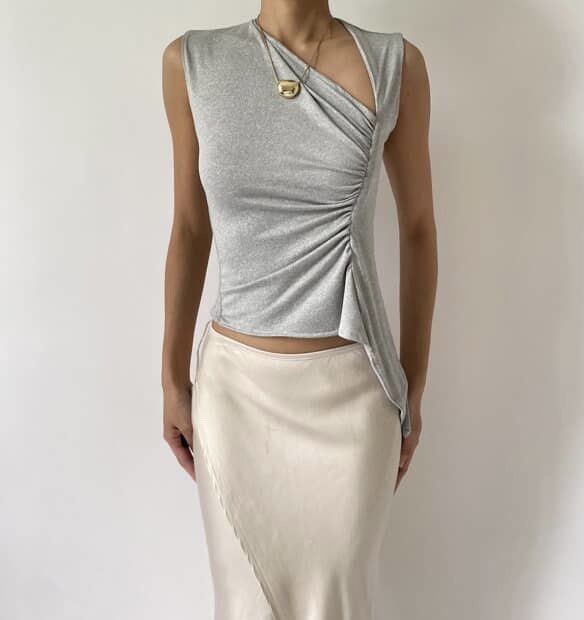 Florice Asymmetrical Sleeveless Ruched Top (Category: Sleeveless) located in Manila. Submitted by limonee (Listing ID 1435367138, Image 1). Description: Bought from @shopflorice on IG for 880 Size M, used 2-3x only.