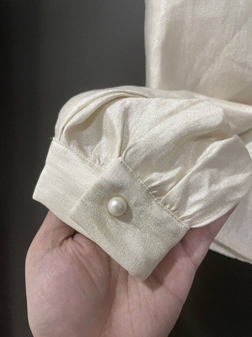Formal White Blouse (Category: Blouses) located in Rizal. Submitted by ethriftstudios (Listing ID 1435445213, Image 3). Description: - The Luxe Studio white blouse. - Round neckline with tie detail. - Long sleeves with buttoned cuffs. - Slightly textured fabric. - Keyhole back. - Perfect for a sophisticated look..