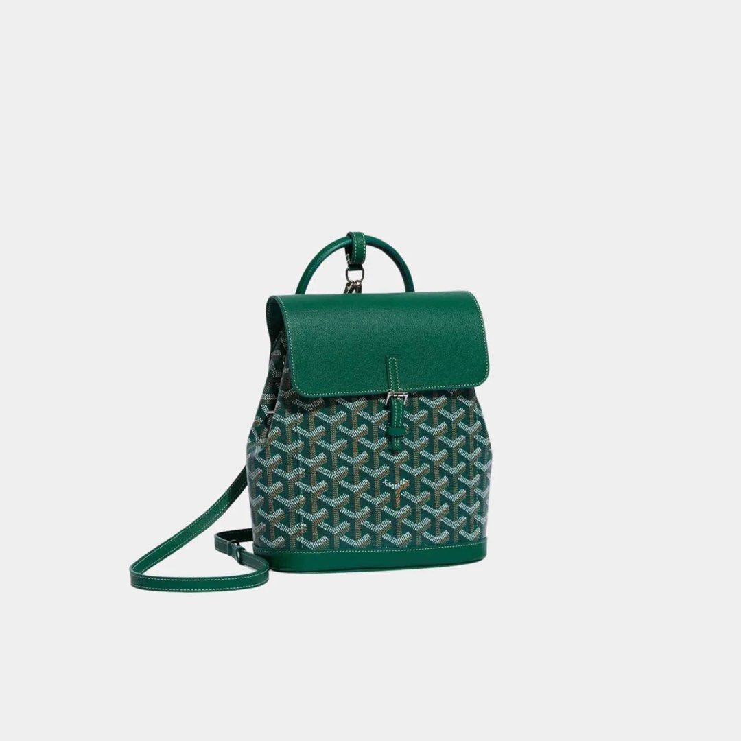 Goyard Green Sling bag/Backpack (Category: Luxury Bags & Wallets) located in Pasay City. Submitted by drogon234 (Listing ID 1435470569, Image 1). Description: - Authentic Goyardine backpack in green - Features a classic flap closure with buckle - Includes a convenient top handle - Adjustable shoulder straps for a comfortable fit - Both interior and exterior are green.