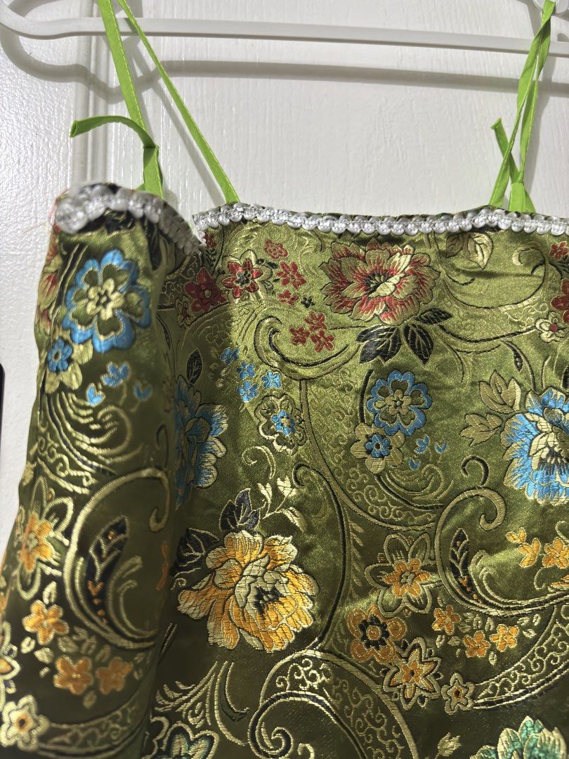 Green Floral Dress (Category: Dresses) located in Manila. Submitted by kykynsss (Listing ID 1435374693, Image 2). Description: Decluttering. Preloved Dress. Pick up only at Brgy La Paz Makati City - Elegant green dress - Floral detailing - Patterned bodice - Flowing, light green skirt - Thin, green straps - Zipper closure - Intricate floral patterns - Ideal for special occasions.