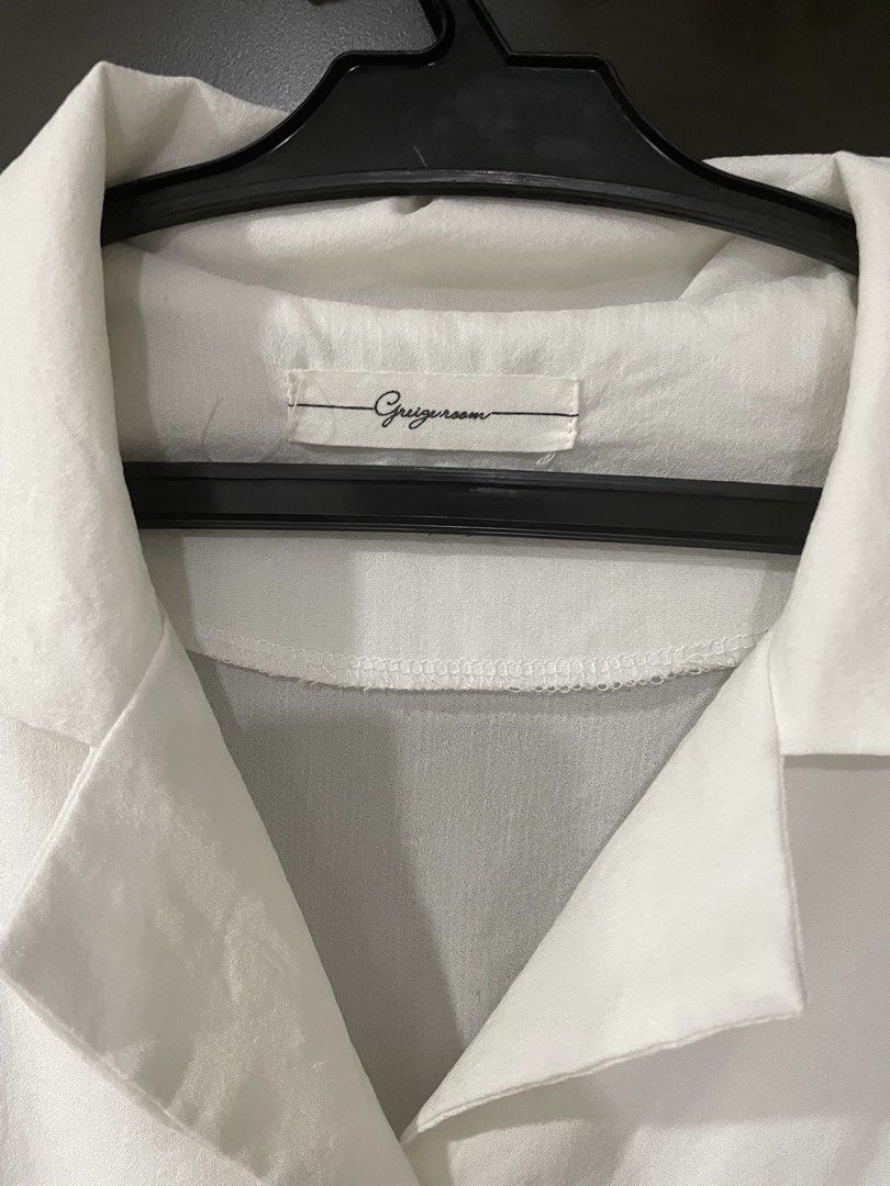 Greige Room White Dress (Category: Dresses) located in Rizal. Submitted by ethriftstudios (Listing ID 1435445871, Image 2). Description: - Greige Room white dress - Collared neckline - Button-down front - Short sleeves - Lightweight fabric - Relaxed fit - Mid-calf length - Simple, minimalist design.