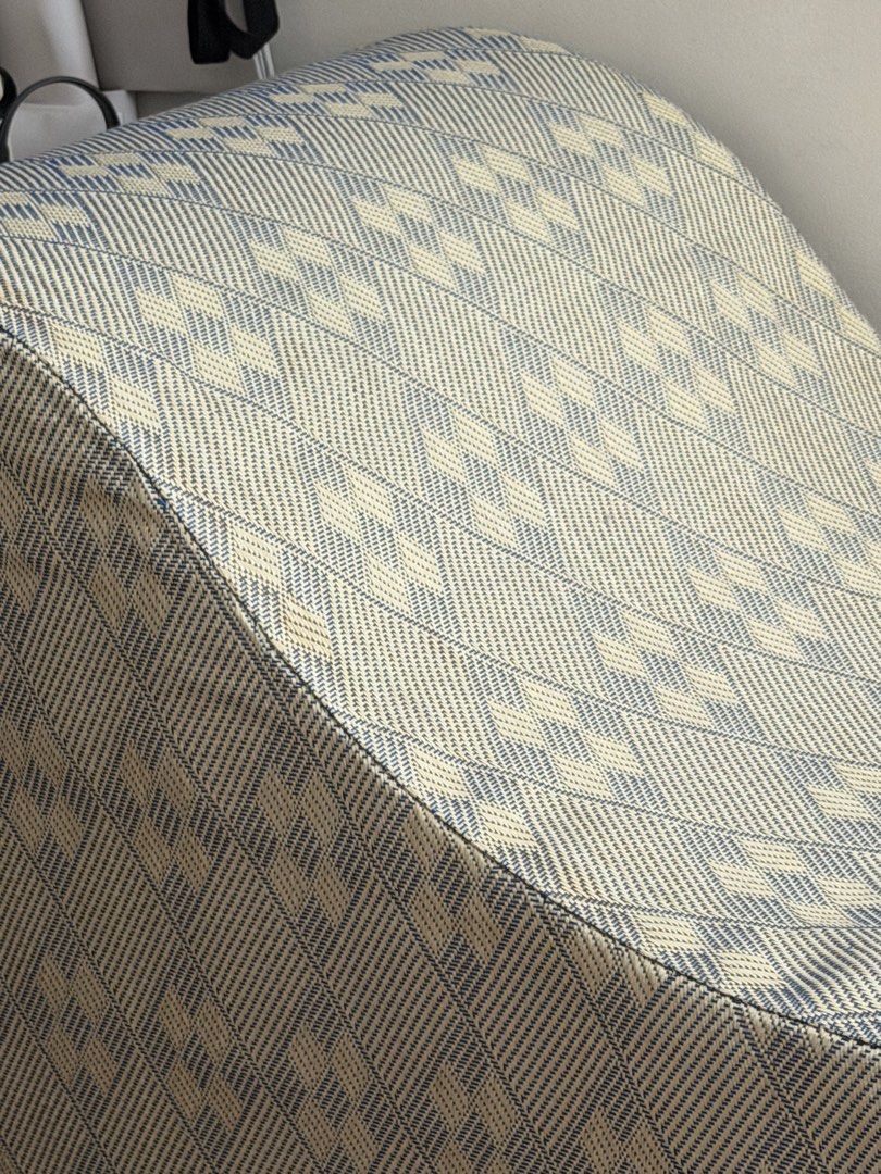 HaloHalo Alon Couch Chaise Lounge (Category: Sofas) located in Manila. Submitted by jenniek24 (Listing ID 1435420437, Image 3). Description: ORIGINAL HALOHALO PIECE ALON COUCH - Stylish chaise lounge with a unique curved design. - Features a woven fabric with a blue and cream geometric pattern. - Well-padded for ultimate comfort. - Ideal for lounging and relaxation. - Detailed weave adds to its aesthetic appeal..