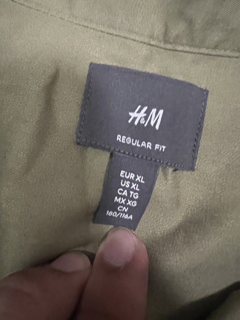 H&M REGULAR FIT SHIRT XL (Category: Tshirts & Polo Shirts ) located in San Fernando. Submitted by notcfrank (Listing ID 1435396932, Image 3). Description: H&M olive green long-sleeved shirt, size XL. Regular fit, mandarin collar. Button closures. Used once-twice. pm if interested.