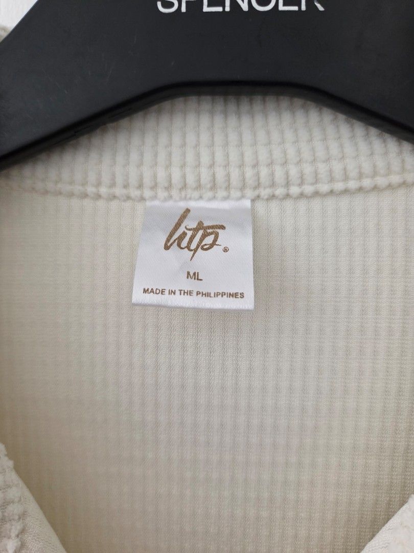 HTP Textured Jacket for Women (Category: Longsleeves) located in General Trias. Submitted by ClutterCrunch (Listing ID 1435392801, Image 2). Description: - Cream color - Waffle texture - Button-down front - With Collar - Size: ML - Made in the Philippines Shipping c/o buyer, thru lalamove or J&T Express MOP: GCash/BDO Decluttering sale: Mix of my own items and my mother's preloved pieces. Location: General Trias, Cavite Thank you!.