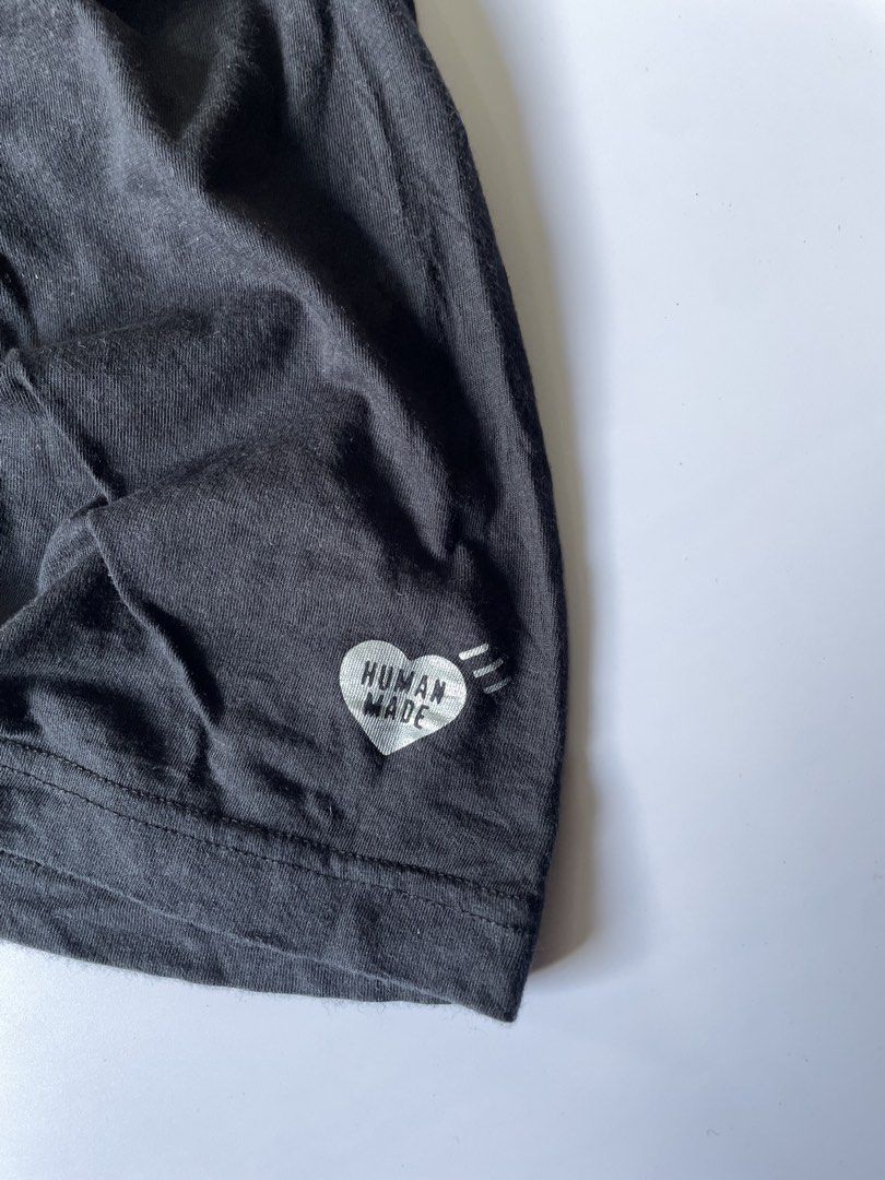 Human Made short-sleeved t-shirt (Category: Coats, Jackets and Outerwear) located in Baguio. Submitted by chronicles_cache (Listing ID 1435497339, Image 2). Description: Condition: Great Size tagged: M Width: 22.5 Length: 26 Shoulder: 20 Sleeve: 8 .