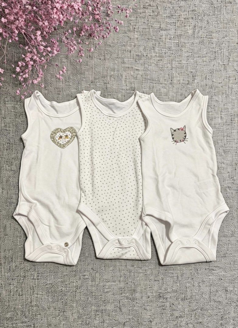 Juniors Baby Bodysuits 12-18 Months (Category: Babies & Kids Fashion) located in Rizal. Submitted by decluttrmomma (Listing ID 1435398281, Image 1). Description: - Set of 3 Juniors baby bodysuits - Size: 12-18 months - Design: Sleeveless with heart, polka dots, and cat face patterns - Material: 100% cotton - Made in China - Care Instructions: - Wash inside out - Do not iron - Wash dark colors separately.