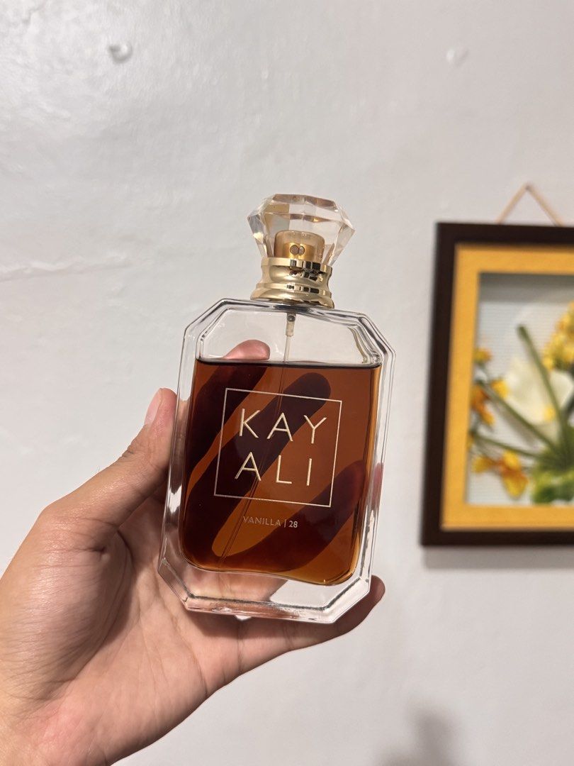 Kayali Vanilla 28 Eau de Parfum (Category: Fragrance & Deodorants) located in Davao. Submitted by hzlnnc (Listing ID 1435367444, Image 1). Description: - Kayali Vanilla 28 Eau de Parfum - Fragrance notes: Vanilla orchid, tonka bean, amber, brown sugar - Warm, amber color - Bottle design: Clear, faceted cap and rectangular shape.
