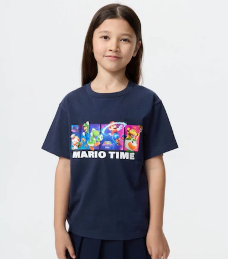 Kids' Mario Time T-shirts (Category: Babies & Kids Fashion) located in Manila. Submitted by isflamingo28 (Listing ID 1435434090, Image 2). Description: Navy blue kids' t-shirts featuring Mario Time graphics. One shirt has "FOUND THE PROBLEM" printed on the back. The other shirt has a colorful Mario graphic on the front. Both shirts appear to be made of a soft material. Perfect for young Mario fans!.