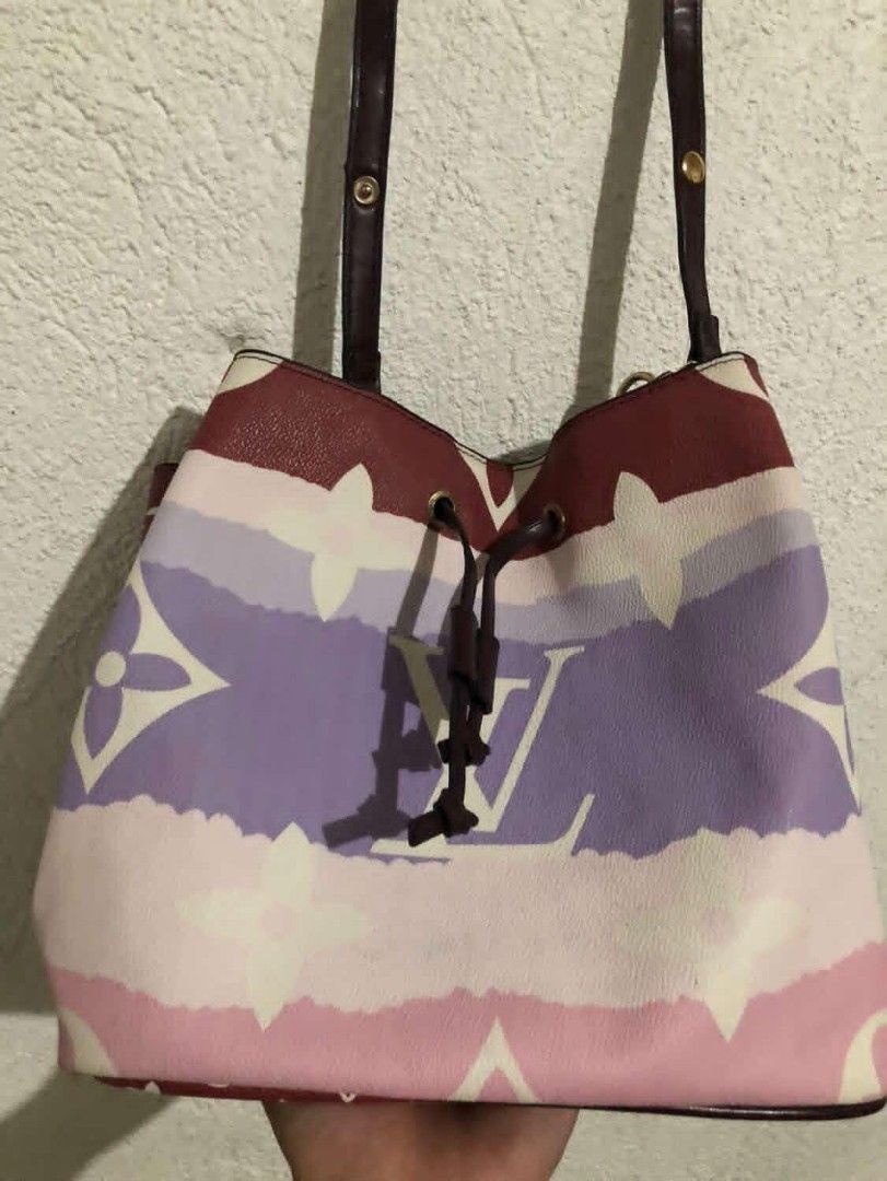 Louis Vuitton Bucket Bag (Category: Luxury Bags & Wallets) located in Manila. Submitted by kuyanyo (Listing ID 1435435499, Image 2). Description: - Authentic Louis Vuitton bucket bag - Unique design with drawstring closure - Eye-catching colorful LV monogram pattern - Includes a shoulder strap - Burgundy base - Black interior - Stylish and ideal for daily wear DM IF INTIRESTED EXCELLENT CONDITION NEEDWASH.