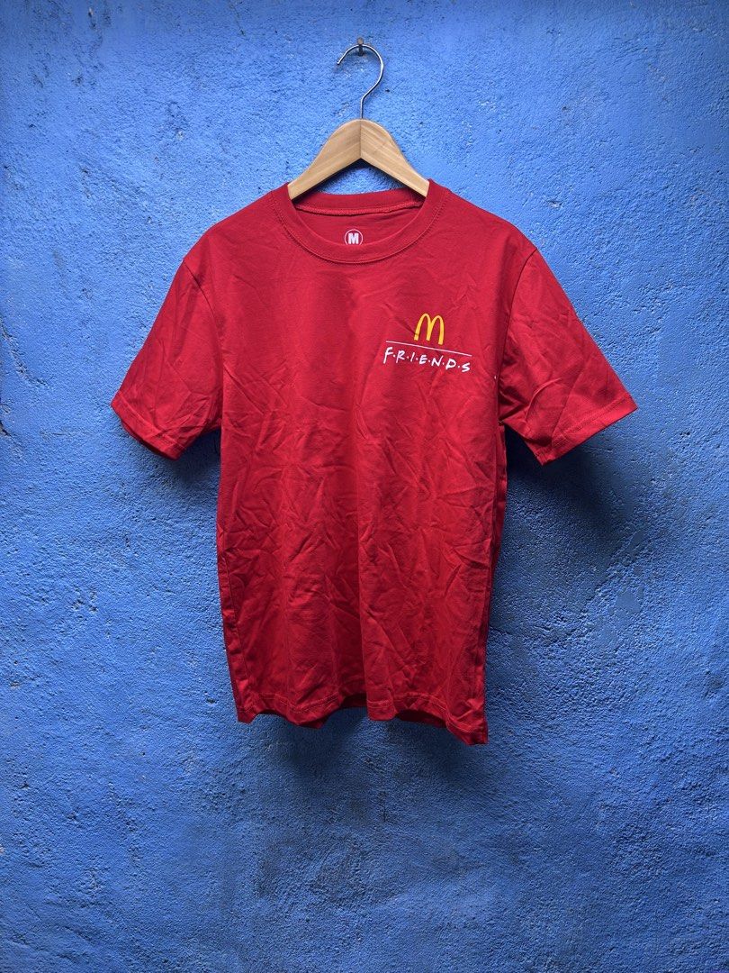 McDonald's Friends T-shirt - Medium (Category: Tshirts & Polo Shirts ) located in Quezon City. Submitted by thriftxgoods (Listing ID 1435493659, Image 1). Description: - McDonald's & Friends design - Features McDonald's logo and "FRIENDS" on the front - Friends characters graphic on the back - Size: Medium - Made in the Philippines - Material: 59% cotton, 41% polyester.