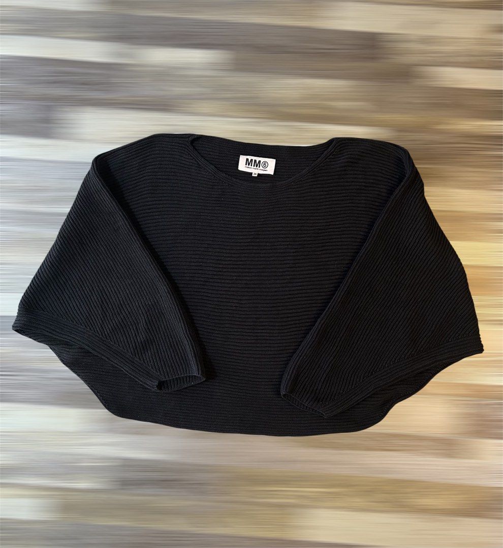 MM6 Maison Margiela Black Knit Sweater (Category: Longsleeves) located in Dasmarinas. Submitted by insaurigaj60770 (Listing ID 1435497811, Image 1). Description: - MM6 Maison Margiela black knit sweater - Round neckline - Wide sleeves - Made in Turkey - Ribbed texture - Size not specified.