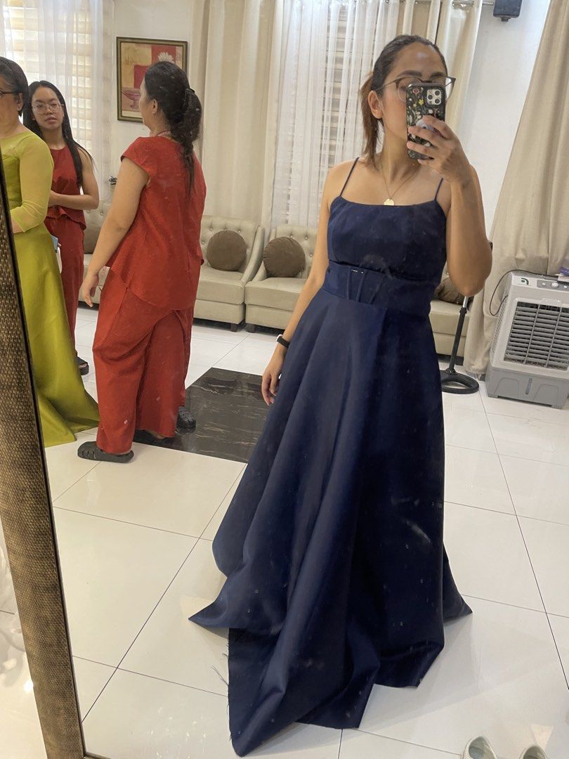 Navy Blue Gown or Dress (Category: Dresses) located in Manila. Submitted by aaavillena (Listing ID 1435405555, Image 3). Description: - Elegant navy blue formal dress - Fitted bodice with spaghetti straps - Wide waistband - Floor-length skirt with a slight train - Made of smooth, Duchess satin fabric - Ideal for special events.