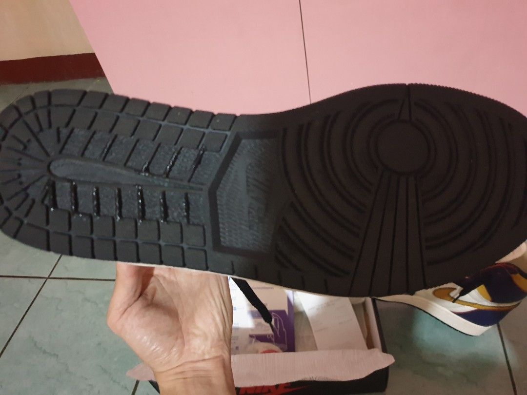 Nike Air Jordan 1 SB (Category: Sneakers) located in Pateros City. Submitted by lance_cagadoc (Listing ID 1435516784, Image 3). Description: - Air Jordan 1 SB Lakers - Colorway: White, Purple, Gold - Includes: Original box, extra laces, authentication documents - Condition: Clean soles - Features: Black laces, white tongue with Nike SB logo size 12 - Insole: Intact Nike SB dunk low size 13US no issue,with box extra lace.