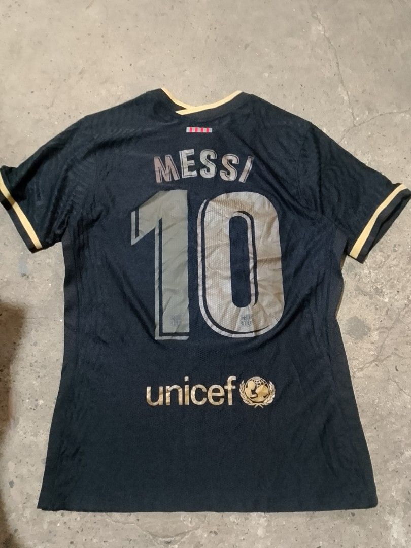 Nike Barcelona Messi Jersey (Category: Activewear) located in Iloilo. Submitted by janillthrifted (Listing ID 1435388529, Image 1). Description: - Authentic Barcelona jersey - Featuring Messi's name and number 10 - Nike Aeroswift VaporKnit - Size: M - Made in Thailand - With Rakuten logo - Barcelona crest included - Color: Black base with gold accents.