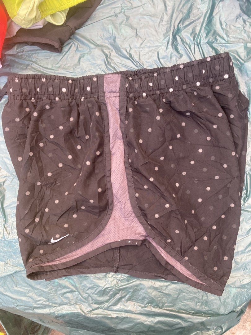 Nike Running Tempo Shorts - Size L (Category: Shorts) located in Tacloban City. Submitted by sid1999 (Listing ID 1435425222, Image 2). Description: - Nike running shorts - Size: L - Color: Dark grey with white polka dots - Features: Drawstring waistband, built-in liner, small Nike logo - Perfect for running and athletic activities Dimensions 14 inch waist stretchable length 15 Looks darker in person Lighting may affect image.