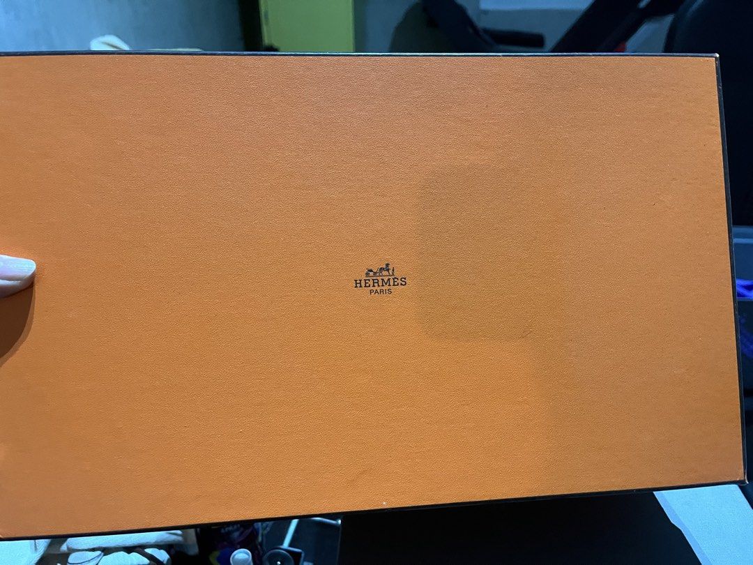 Original Hermes Box (Category: Luxury Accessories) located in Quezon City. Submitted by pepching22 (Listing ID 1435378441, Image 1). Description: - Authentic Hermes box - Orange color - Rectangular shape - Features the Hermes logo - Perfect for storing Hermes items - Great as a gift box.