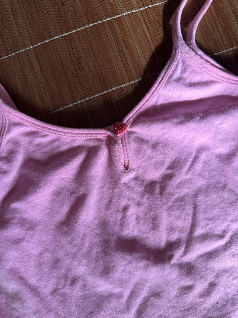Pink Camisole with Red Trim (Category: Sleeveless) located in Valenzuela. Submitted by sol___ (Listing ID 1435415281, Image 3). Description: - Pink camisole - Red trim at the bottom - for kids or xxs adults - Features a small heart detail - Made of soft fabric - Two pieces available (P90 each).