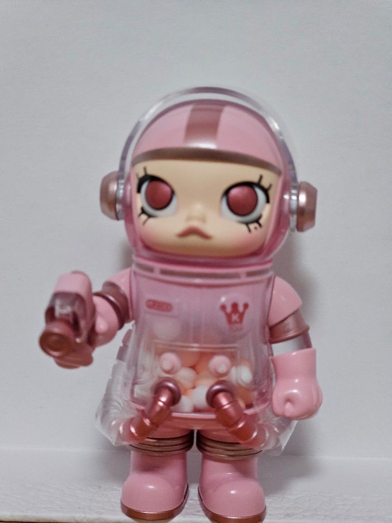 Pop Mart Space Molly Smitten Love (Category: Designer & Blind Box Toys) located in Quezon City. Submitted by destashingme (Listing ID 1435498011, Image 2). Description: - Pop Mart Mega Space Molly Smitten Love figure - Features a pink astronaut design - Clear bubble-like helmet - Container filled with white and pink spheres - Detailed design with gold accents - Includes card with figure name and design - Brand new with card.