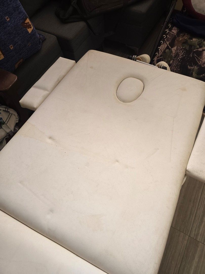 Portable Massage Table (Category: Massage Devices) located in Rizal. Submitted by imnotraf (Listing ID 1435337540, Image 2). Description: - Portable massage table - Cream-colored surface - Includes face cradle and armrests - Foldable design for easy storage - Metal legs for stability - Ideal for professional or personal use - Perfect for massage therapists.