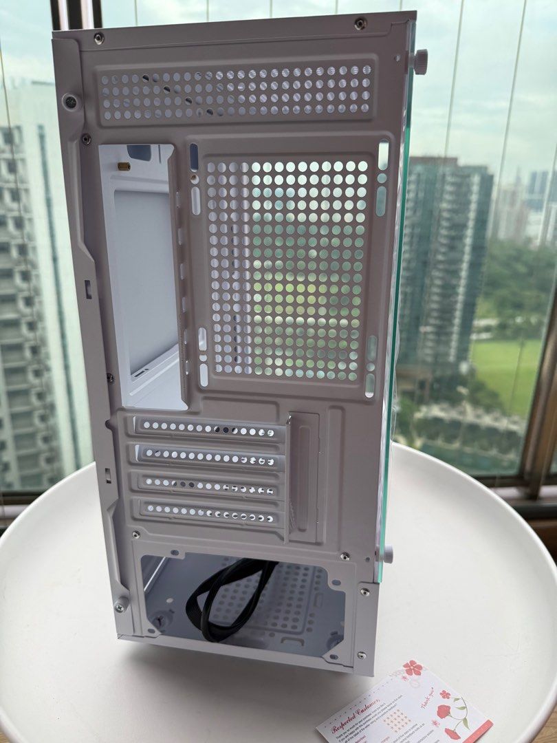 Power train computer casing (Category: Computer Parts) located in Singapore. Submitted by xenders (Listing ID 1399465806, Image 3). Description: Brand new in box as per pics White Colour Retails at $90 Self collect at Normanton Park condo or add $15 for islands wide delivery Side a bit Dent in pics but the casing is new selling cheap to clear Not for fussy.