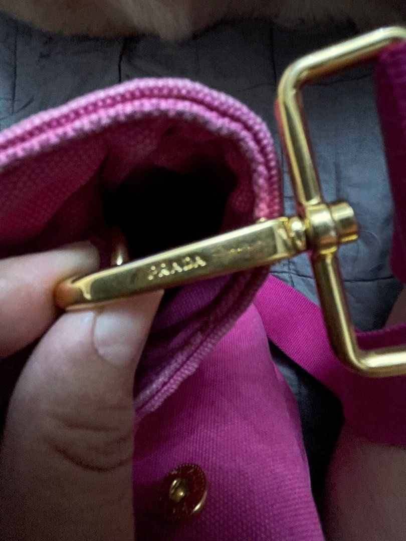 Prada Canapa Tote Bag (Category: Luxury Bags & Wallets) located in Muntinlupa City. Submitted by karmeeda_p (Listing ID 1435455058, Image 2). Description: Price negotiable. No to low-ballers - Authentic Prada Canapa tote bag - Color: Pink - Material: Canvas - Hardware: Gold-tone - Includes: Detachable strap and authenticity cards - Features Prada logo - Gold studs on the bottom - Made in Italy.
