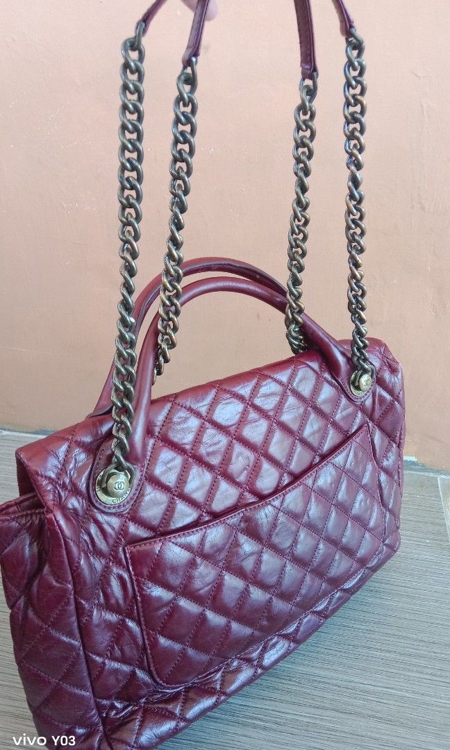 Preloved Chanel 2way bag with hologram (Category: Shoulder Bags) located in Cabuyao City. Submitted by selections888 (Listing ID 1435403688, Image 3). Description: preloved from Japan supplier color red 2way bag med-large size with hologram sticker /code made in italy chanel engraved on hardwares expect signs of use as preloved still.good for daily use.