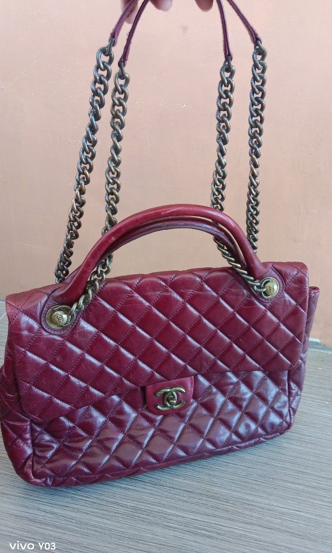Preloved Chanel 2way bag with hologram (Category: Shoulder Bags) located in Cabuyao City. Submitted by selections888 (Listing ID 1435403688, Image 2). Description: preloved from Japan supplier color red 2way bag med-large size with hologram sticker /code made in italy chanel engraved on hardwares expect signs of use as preloved still.good for daily use.