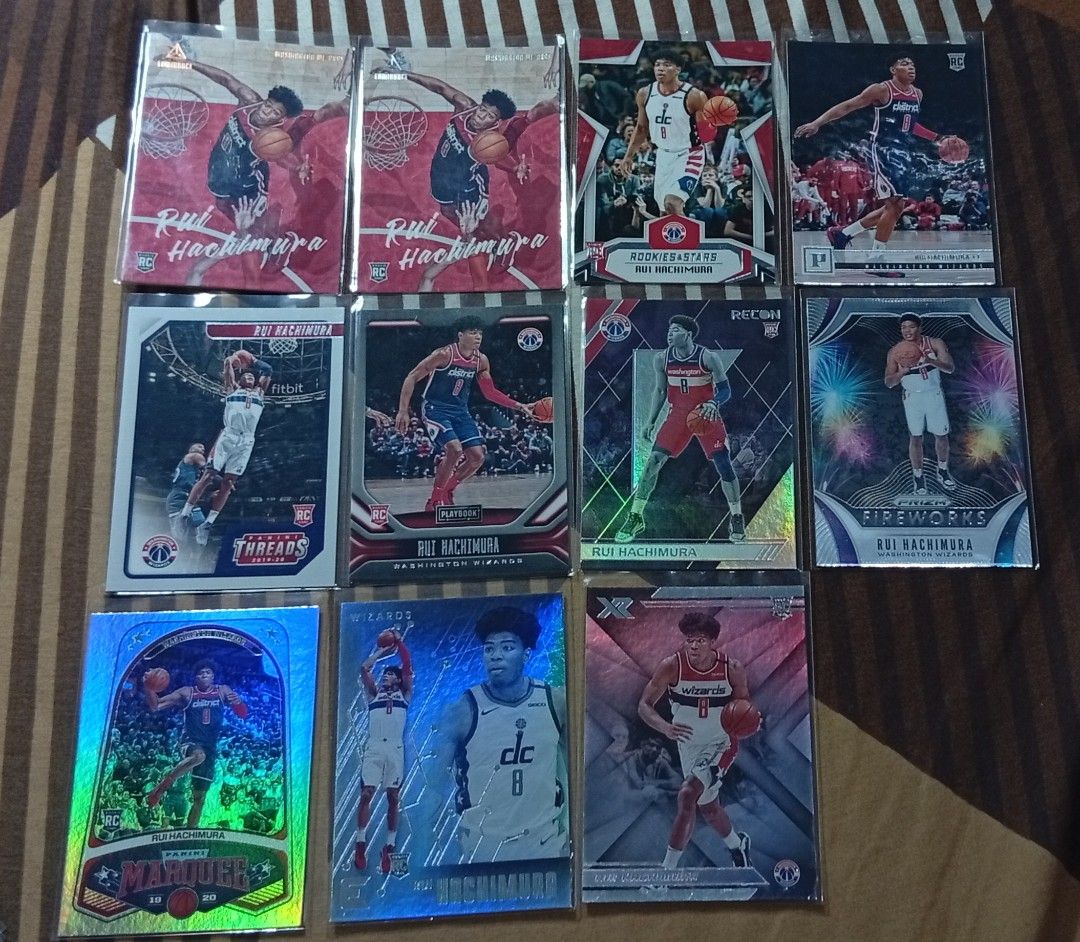 Rui Hachimura Rookie Cards Lot (Category: Raw Singles) located in Manila. Submitted by back_to_the_thrift (Listing ID 1435461115, Image 1). Description: - Rui Hachimura basketball card collection. - Features cards of Rui Hachimura in his Washington Wizards Rookie year - Cards from various Panini sets. - Includes cards in protective sleeves. - Showcases different action shots and designs..