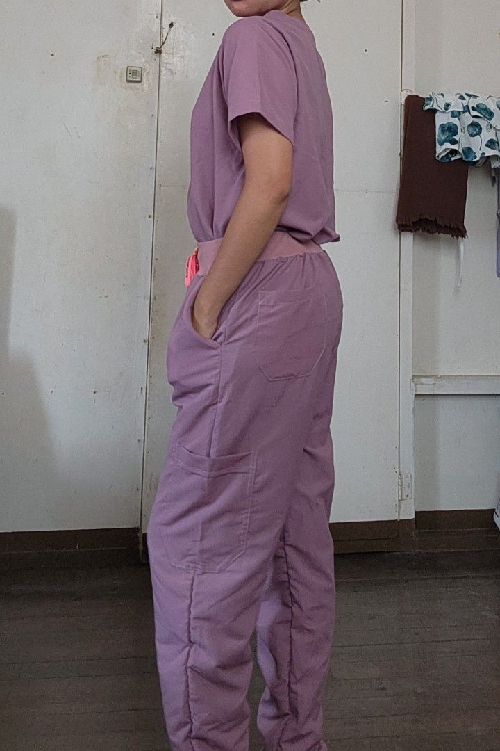 Scrub Suit - Lavender (Category: Sets or Coordinates) located in Lingayen. Submitted by brulee21 (Listing ID 1435386953, Image 3). Description: - SD Easy Wear Lavender Scrub Suit - Includes V-neck top with chest pocket - Cargo pants with drawstring waist - Pants have side pockets and cuffed ankles - large size fits (L-XL) - Made of lightweight material RFS: too big or wrong size sizing down for reference: model height: 5'6" wt:67kg.
