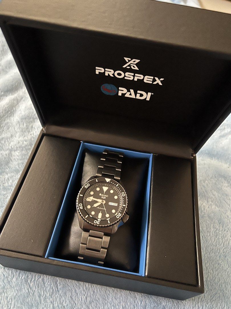 Seiko Prospex PADI Automatic Watch (Category: Luxury Watches) located in Binan City. Submitted by thetidyqueen (Listing ID 1435377029, Image 1). Description: - Seiko Prospex PADI automatic watch - Black dial with luminous hands and markers - Date display - Stainless steel bracelet - Unidirectional rotating bezel - Comes with original box - Water-resistant Seiko SRPD65 in SKX Black/ Preloved Caliber 4R36, automatic with manual winding.