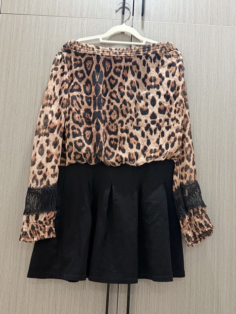Sheer leopard print top lace dress (Category: Sets or Coordinates) located in Pasay City. Submitted by wuangel_ (Listing ID 1435467588, Image 1). Description: Pattern: All-over animal/leopard print in brown and black. Top Details: Off-the-shoulder neckline with a smocked or elasticated hem and blouson sleeves featuring black lace inserts near the cuffs. Bottom Details: A solid black, pleated or flared, skirt section..