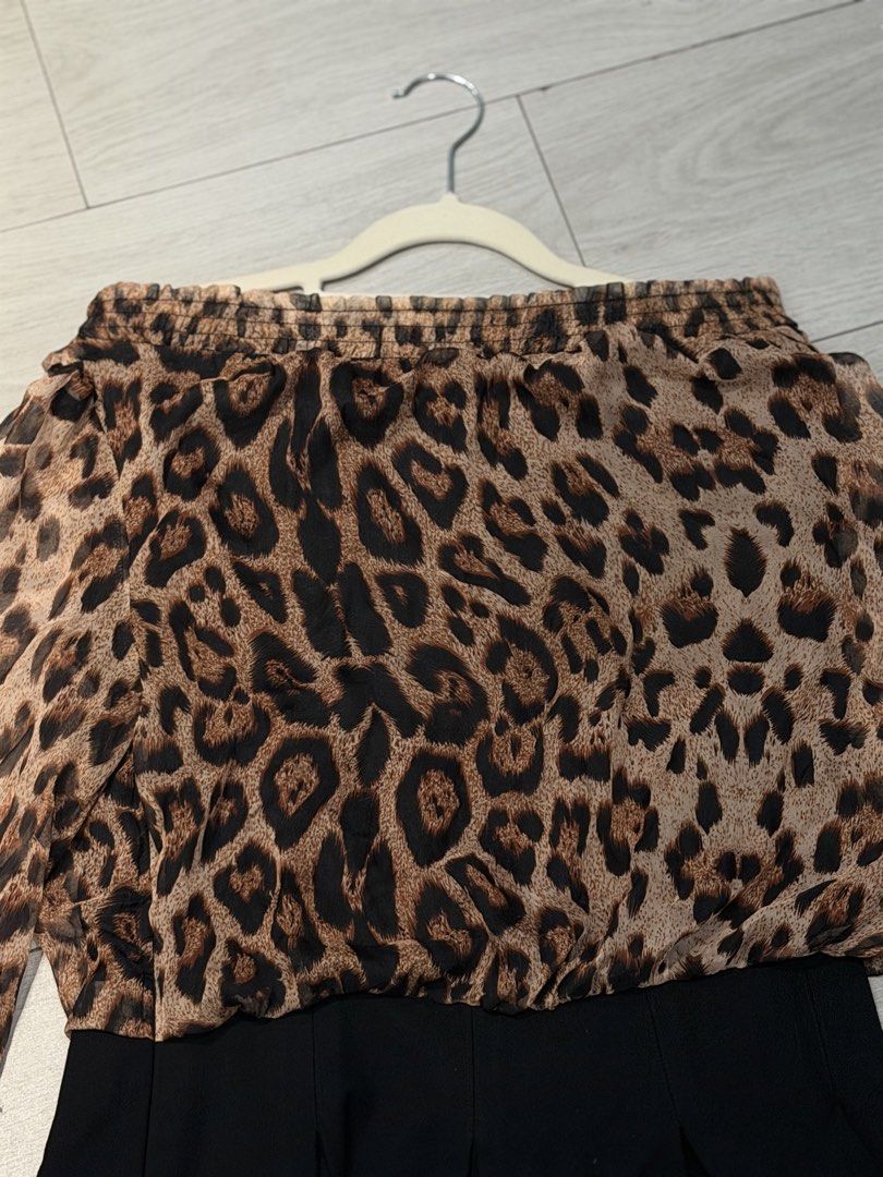 Sheer leopard print top lace dress (Category: Sets or Coordinates) located in Pasay City. Submitted by wuangel_ (Listing ID 1435467588, Image 2). Description: Pattern: All-over animal/leopard print in brown and black. Top Details: Off-the-shoulder neckline with a smocked or elasticated hem and blouson sleeves featuring black lace inserts near the cuffs. Bottom Details: A solid black, pleated or flared, skirt section..