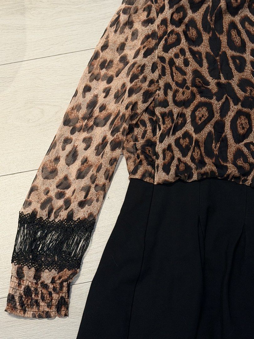 Sheer leopard print top lace dress (Category: Sets or Coordinates) located in Pasay City. Submitted by wuangel_ (Listing ID 1435467588, Image 3). Description: Pattern: All-over animal/leopard print in brown and black. Top Details: Off-the-shoulder neckline with a smocked or elasticated hem and blouson sleeves featuring black lace inserts near the cuffs. Bottom Details: A solid black, pleated or flared, skirt section..