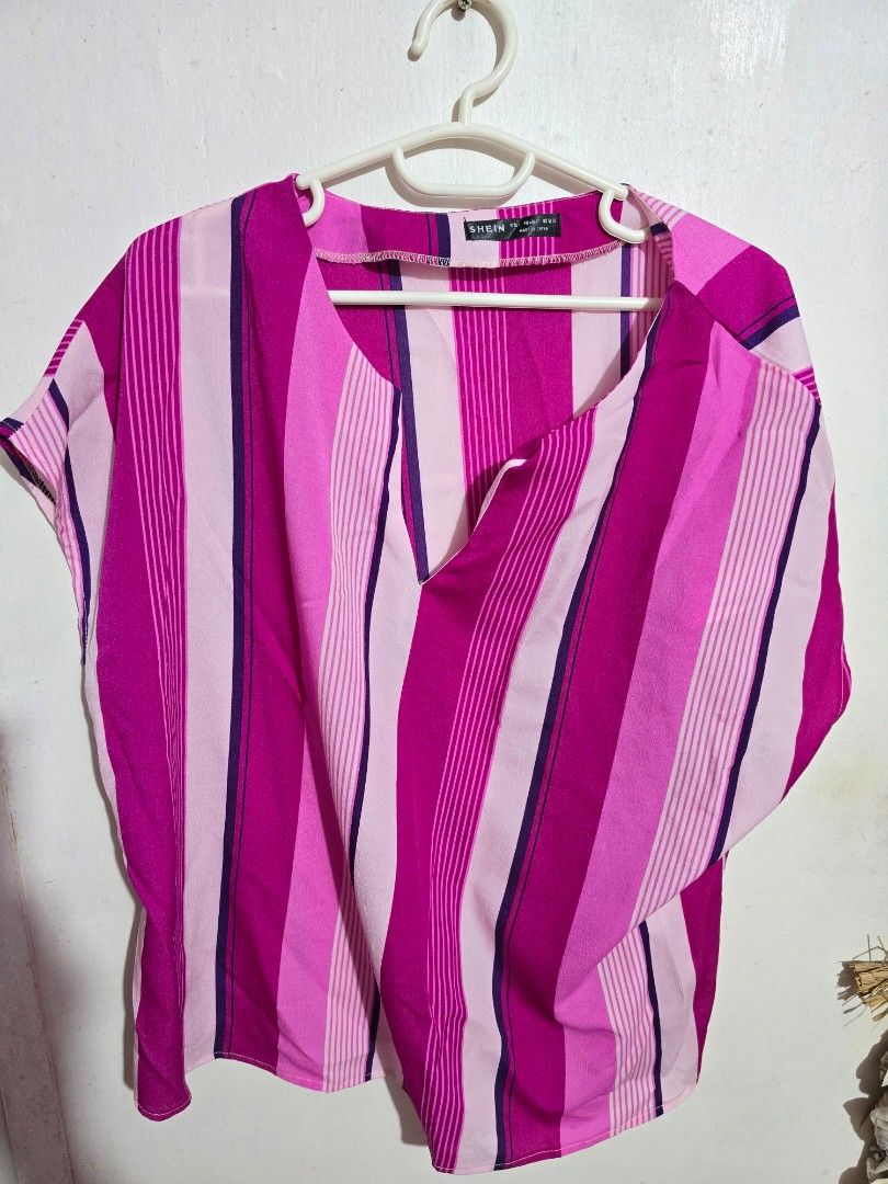 Shein Striped Blouse Pink (Category: Blouses) located in Manila. Submitted by hellomrys (Listing ID 1435391739, Image 1). Description: - Shein blouse L - Striking pink striped pattern - V-neck .