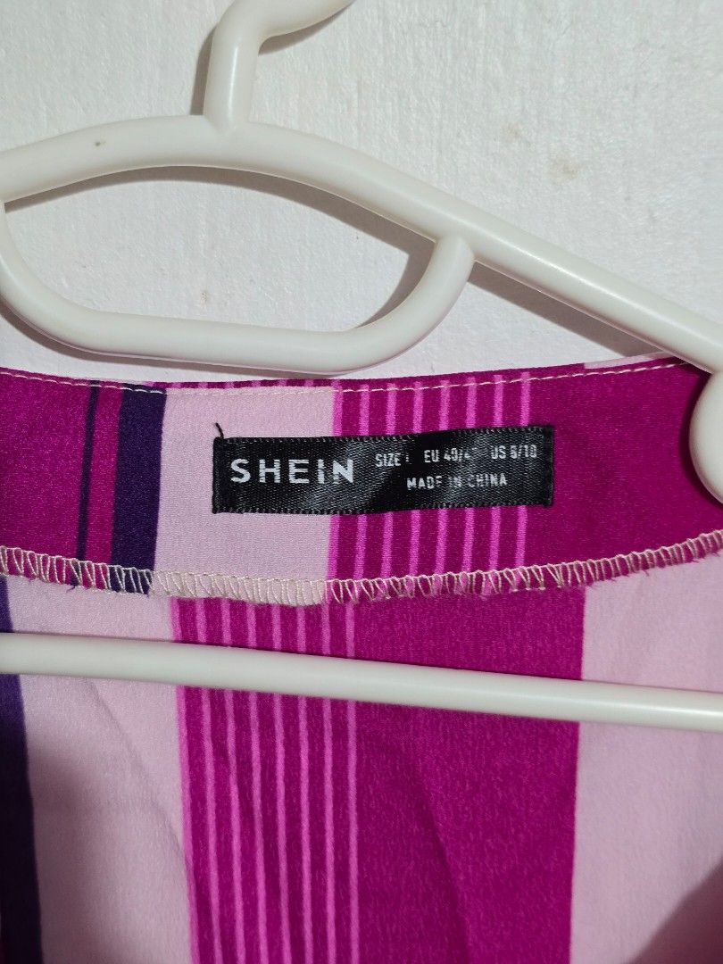 Shein Striped Blouse Pink (Category: Blouses) located in Manila. Submitted by hellomrys (Listing ID 1435391739, Image 2). Description: - Shein blouse L - Striking pink striped pattern - V-neck .