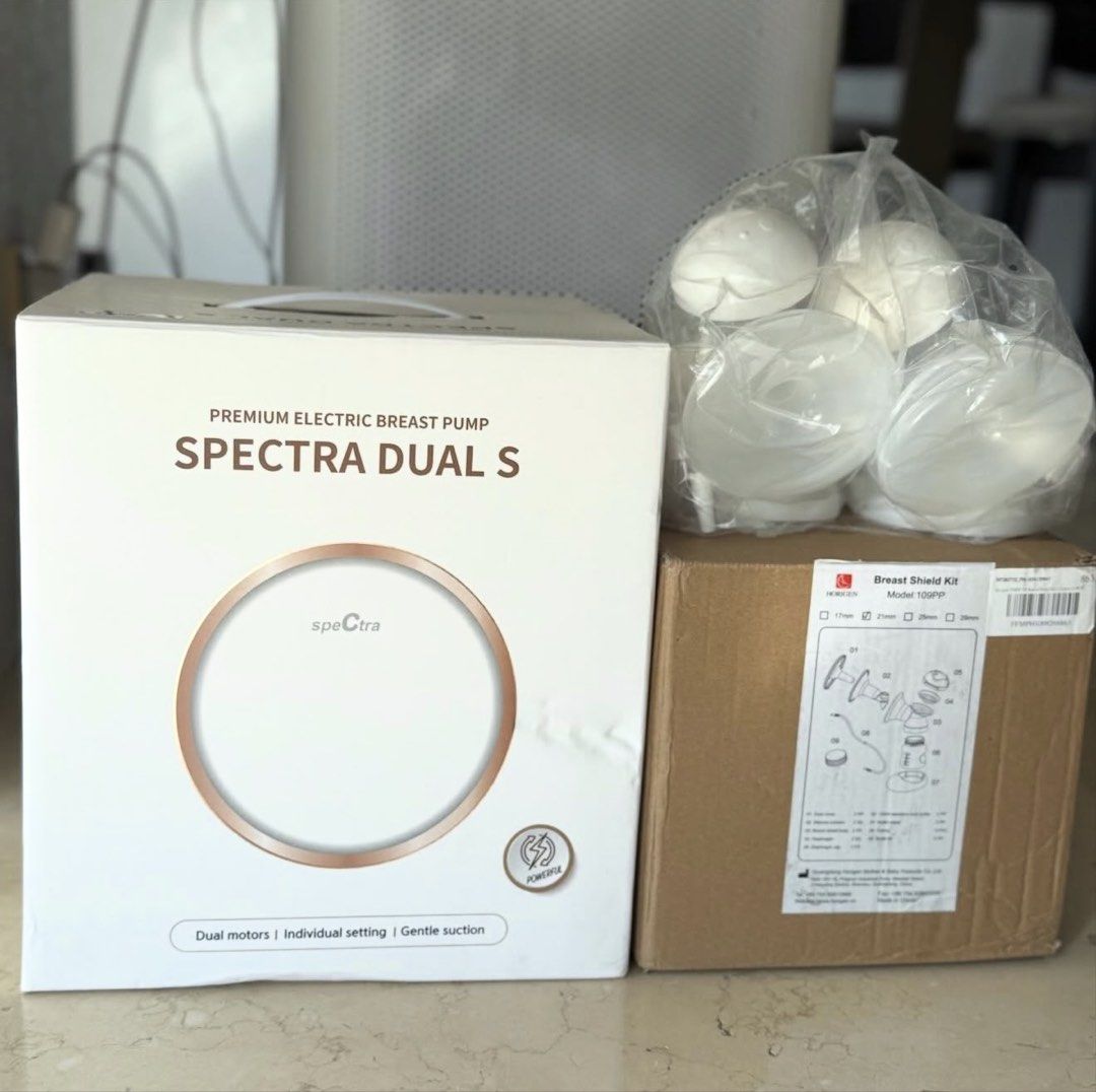 Spectra Dual S Premium Electric Breast Pump (Category: Breastfeeding & Bottle Feeding) located in San Juan City. Submitted by tinywaddles (Listing ID 1435338468, Image 1). Description: Spectra Dual S Original price Php 17,000+ Horigen flange set (2 pairs • 21mm & 24mm) — Bec the spectra ones are matigas / masakit daw! But haven’t tried hehe Original price Php 1,100 each ❗️BRAND NEW (Spectra opened just to test if working. Flange sets all sealed) 