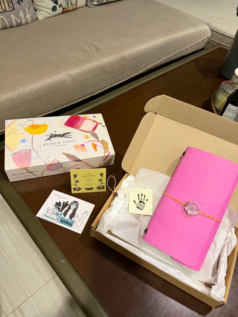 Sting & Snout Bindery Leather Folio Travelers (Category: Stationery & School Supplies) located in Manila. Submitted by memorylanestore (Listing ID 1435389743, Image 3). Description: Brand: Sting & Snout Bindery Color: Pink Sorbet Size: TRAVELERS BRANDNEW Complete with the original box/packaging RFS: Gifted by my sister but I already have an existing folio What's included? 1 x Leather Cover & Cord 2 x Plain Tomoe Notebook Refills (120 pages) Dimen