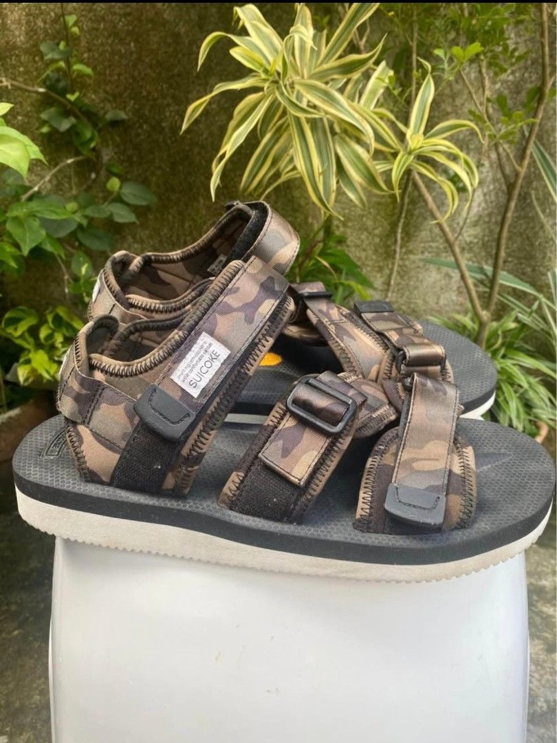 Suicoke Camo Sandals (Category: Activewear) located in Cavite. Submitted by circa1925 (Listing ID 1435365139, Image 2). Description: - Suicoke camo sandals - Adjustable straps for a custom fit - Black sole with a white border - Features the Suicoke logo - Size indicated on inner strap Suicoke x End sandals Size 11us Excellent condition 3,000 plus sf or meetup ( manila / cavite ).