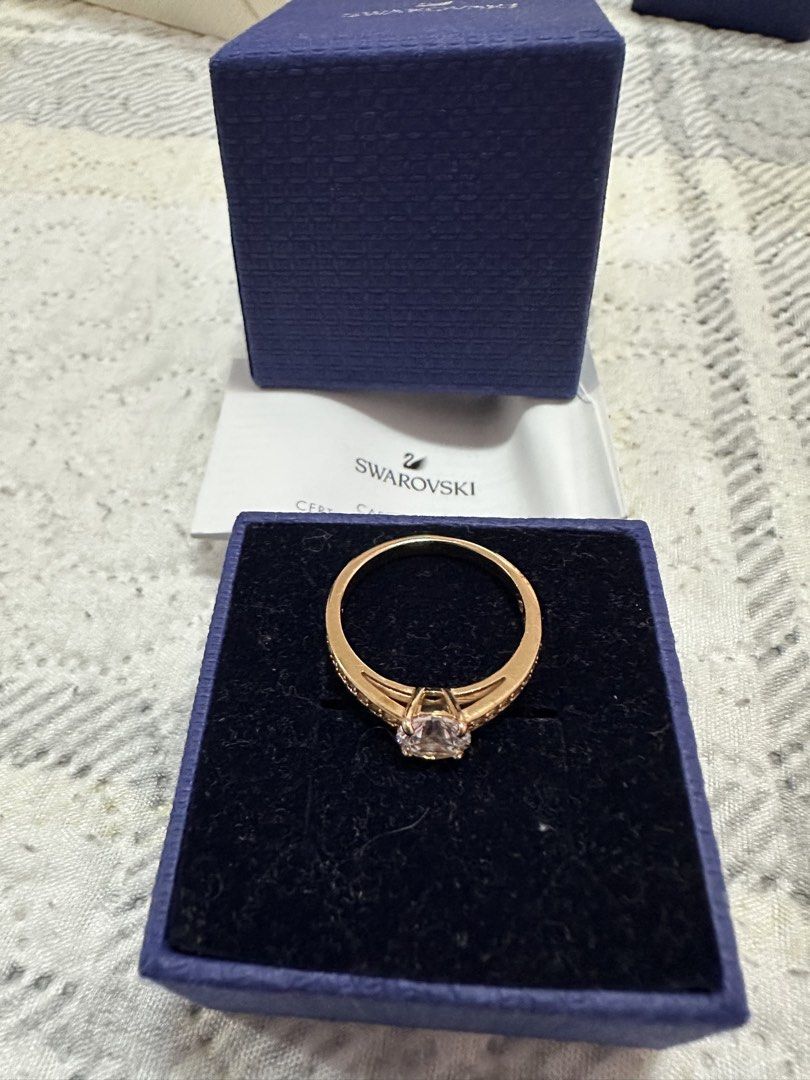 Swarovski Ring (Category: Rings) located in Pasig City. Submitted by sandy120913 (Listing ID 1435417706, Image 2). Description: - Authentic Swarovski ring - Rose gold color - Sparkling clear stone - Includes: - Original box - Receipt - Certificate of authenticity - Care advice - Ring size: 58.