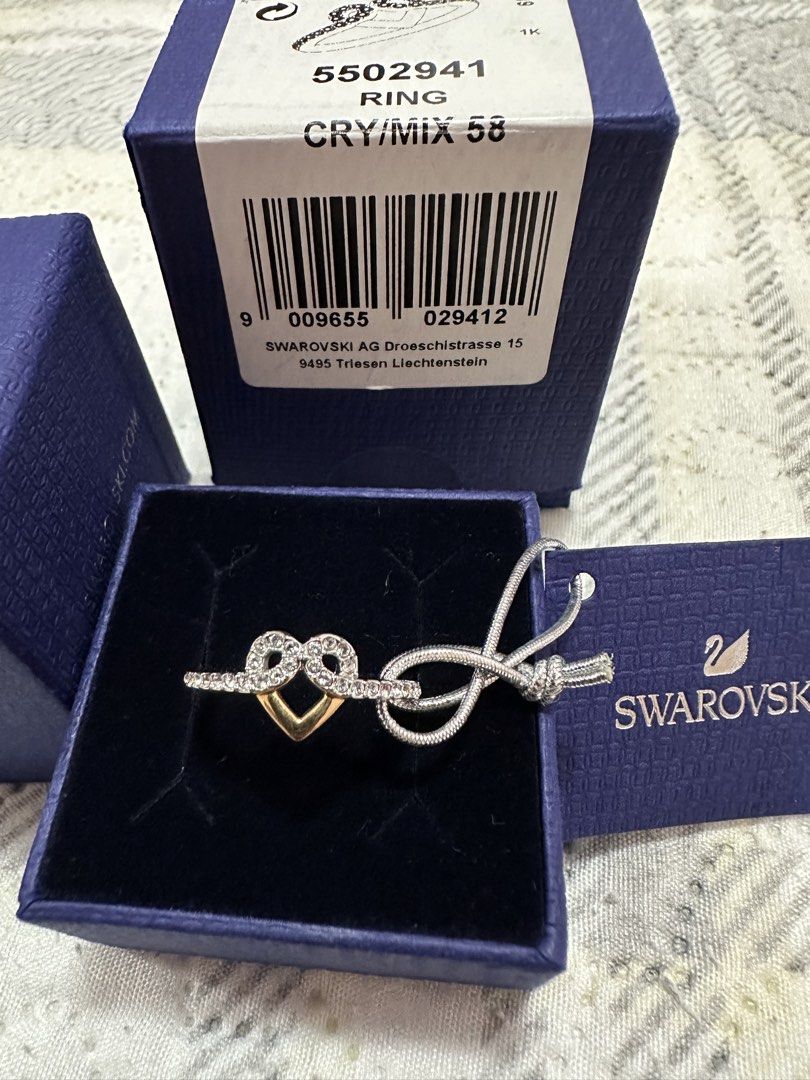 Swarovski Ring 5502941 CRY/MIX 58 (Category: Rings) located in Pasig City. Submitted by sandy120913 (Listing ID 1435420789, Image 2). Description: - Authentic Swarovski ring - Heart design with crystals and gold-tone accents - Ring size: 58 - Includes original box, tag, and packaging - Perfect for gifting or collecting.